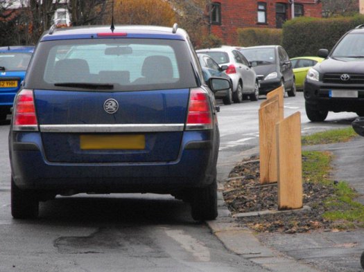 Cars are now prevented from parking on grass verges